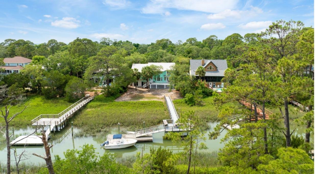 Marshfront Home on Tybee with Private Floating Dock and $90K Rental Potentential